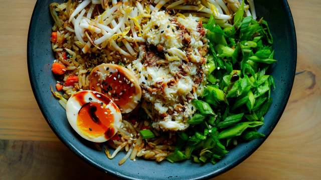 Duck Fried Rice - duck breast, carrots, scallions, bean sprouts, sweet soy glaze, toasted sesame seeds, marinated jammy egg