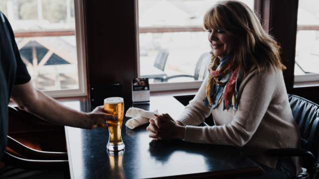 woman getting a beer
