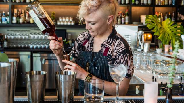 A bartender at Claret, the bar inside of the Bourbon Orleans Hotel