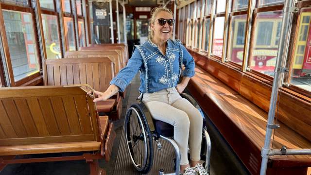 A woman in a wheelchair aboard the streetcar