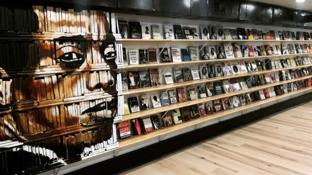 A bookshelf inside Baldwin & Co.