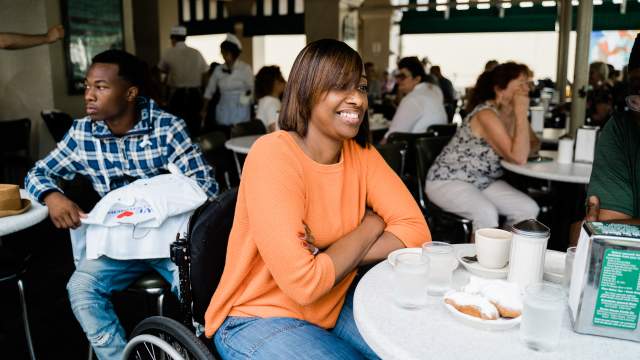 Enjoying beignets at Cafe du Monde