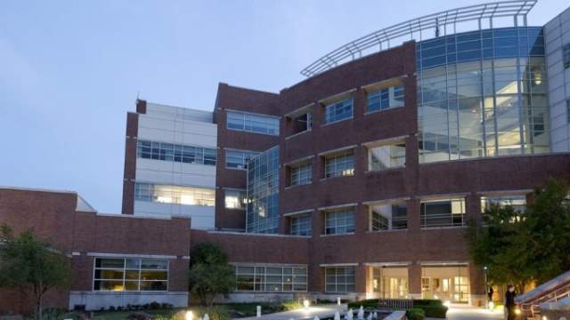 The front of the national weather center at dusk