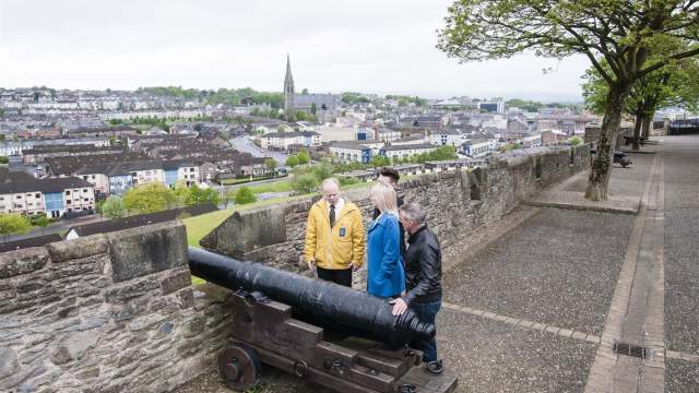 Visitors and tour guide on Martin McCrossan City Tours