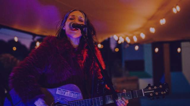 A folk singer performs in Orlando.