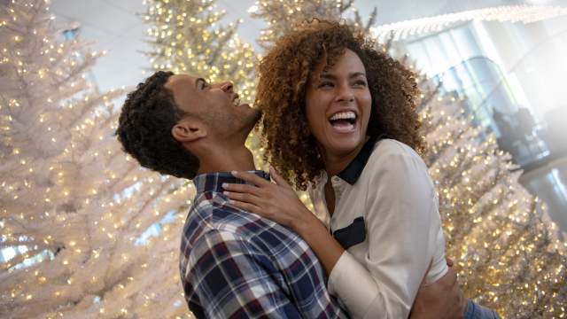 A couple enjoys the Holidays at Universal Orlando Resort.