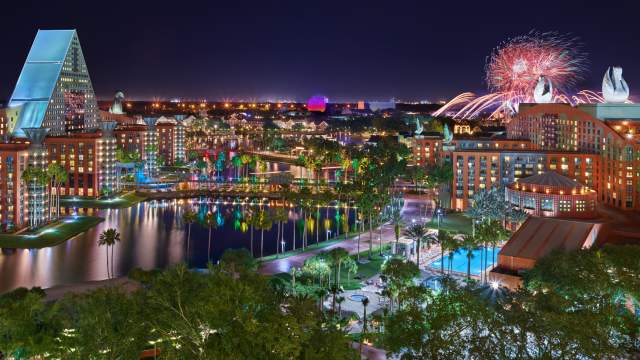 Night resort overview with fireworks of Walt Disney World Swan and Dolphin Resort