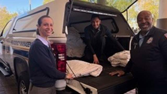 tm-Loading-Blankets-in-Van-for-delivery