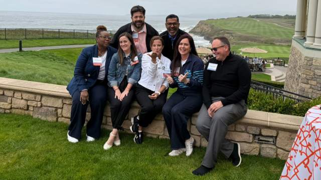 Visit Orlando team members with clients at a West Coast event