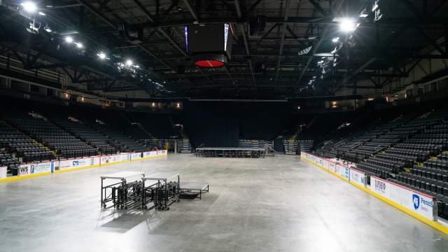 An empty arena with a stage