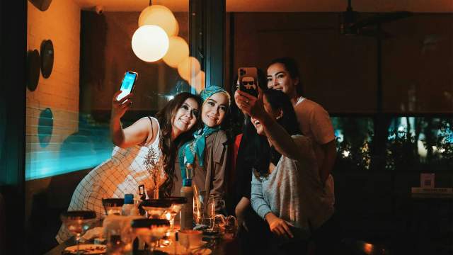 Women Celebrating On A  Girls Getaway