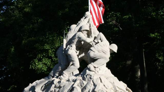 A statue of Marines putting up an American Flag