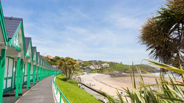 A photograph of the huts at Langland Bay Beach