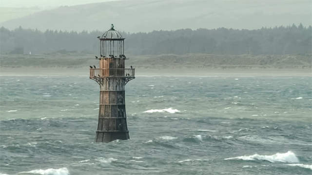 Whiteford Lighthouse at high tide