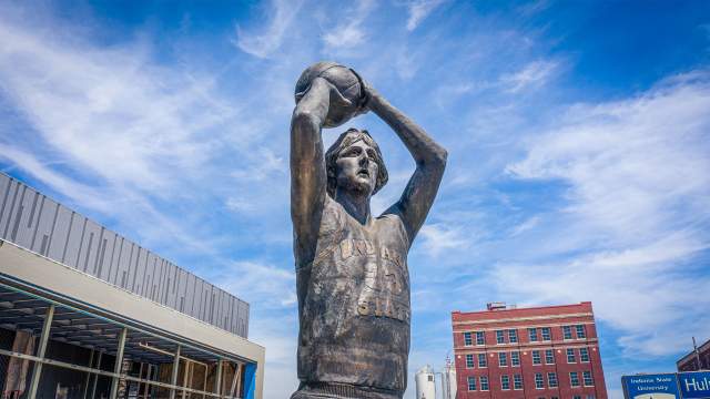 Elevated angle of Larry Bird statue on Indiana State University campus in Terre Haute, Indiana