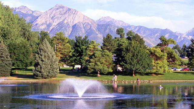 Lake at Liberty Park with view of mountains