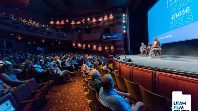 Audience Watching The Stage At "Changing the Game" post-film Q&A at the 2019 Damn These Heels Festival.