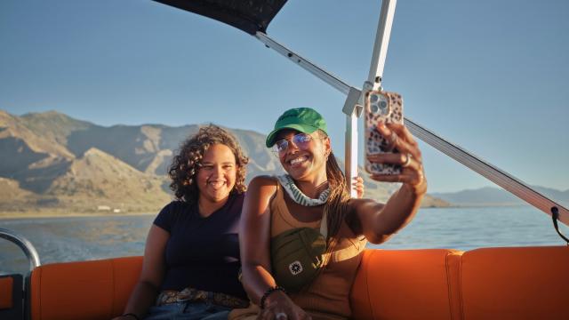 Mother and daughter taking a selfie on a boat tour of the Great Salt Lake.