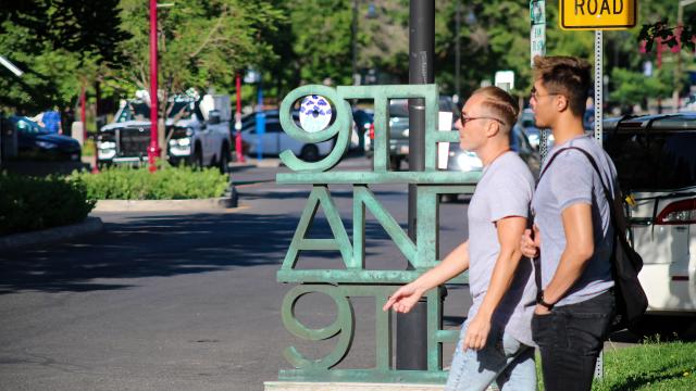Two friends walking in Salt Lake's 9th and 9th neighborhood