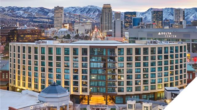 View of the Asher Adams from The Gateway with Downtown Salt Lake and mountains in the background