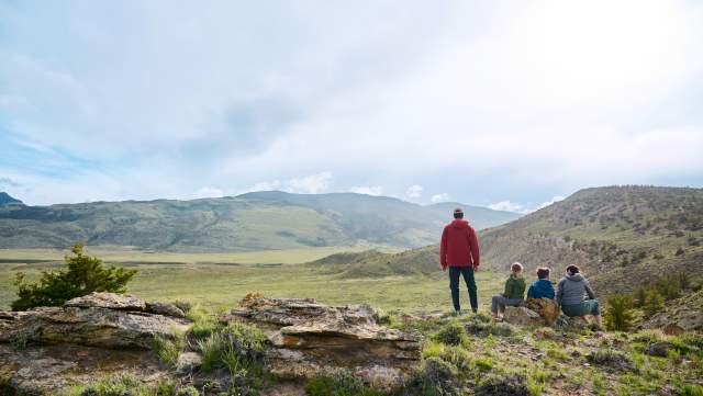 Family hiking in rugged landscape