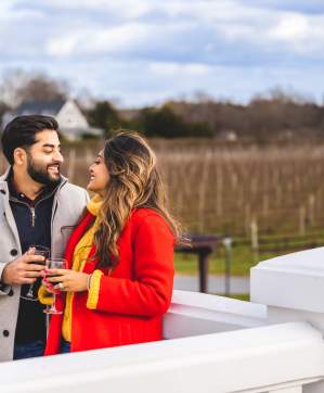 couple overlooking a vineyard