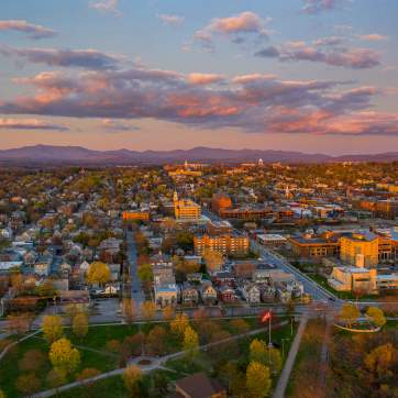 sunset glow over Burlington city and the distant mountains