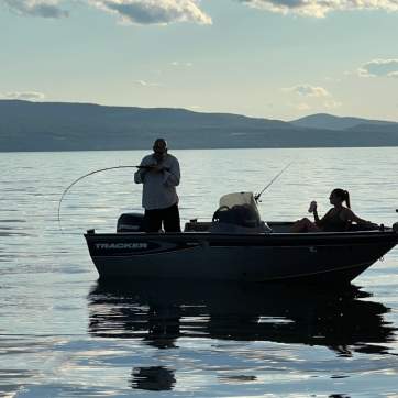 fishing on skipper on Lake Champlain in the summer