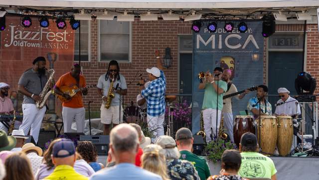 JazzFest stage with musicians performing