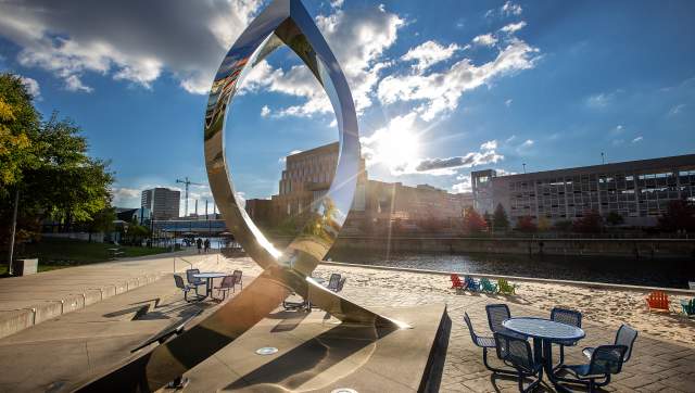 Sculpture at Rotary Park with the Grand River in the background.