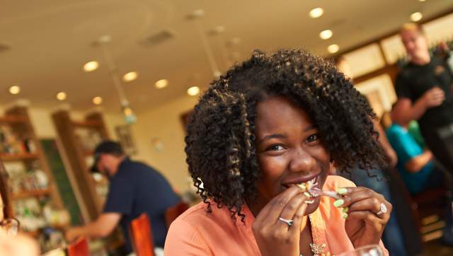Woman eating at a restaurant