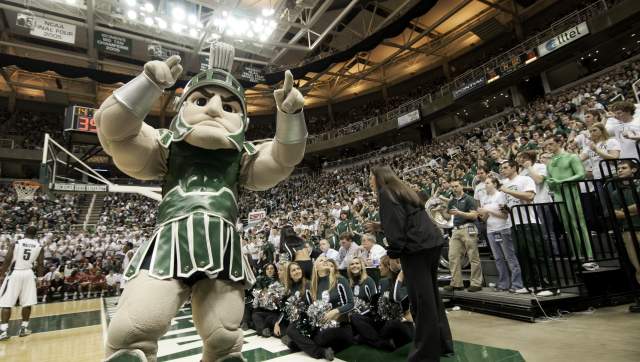 Sparty mascot on the Breslin Center court