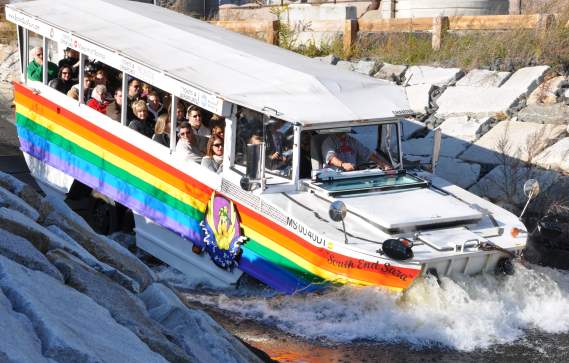 Full Duck Tour vehicle as it drives into the water