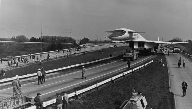 A view of the XB-70 Valkyrie aircraft being moved along a roadway as it was taken to the new Air Force Museum building in 1970.