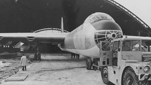 Moving the B-36 "Peacemaker" bomber into the first hangar of the new Air Force Museum building in 1970.