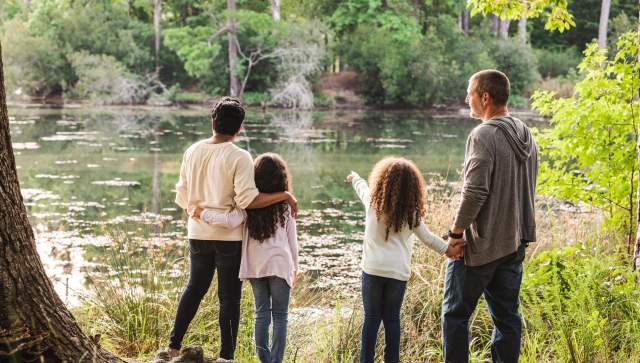 Family looking at a lake
