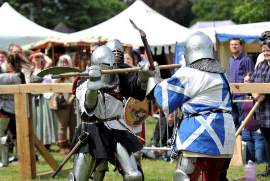Knights battling at Fantasy Forest Festival at Sudeley Castle & Gardens in Cheltenham.