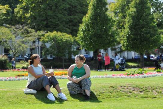 Ladies sat in Imperial Gardens in Cheltenham