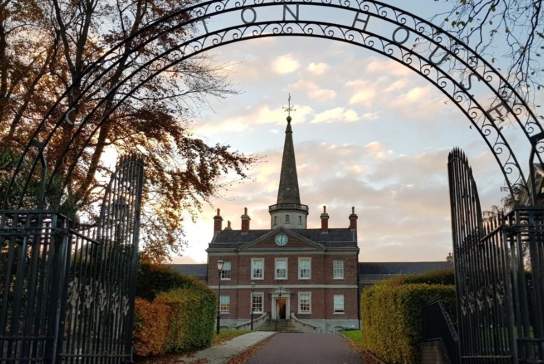 View of the exterior of Clifton House - The Belfast Poor House through the gate