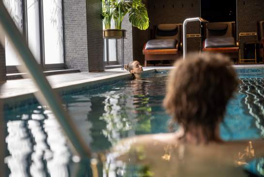 Couple relaxing in the pool at Ebrington Hotel in Derry~Londonderry.