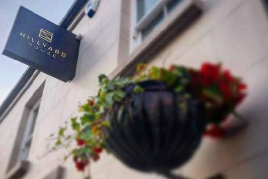 Exterior shot of the signage at Hillyard House.