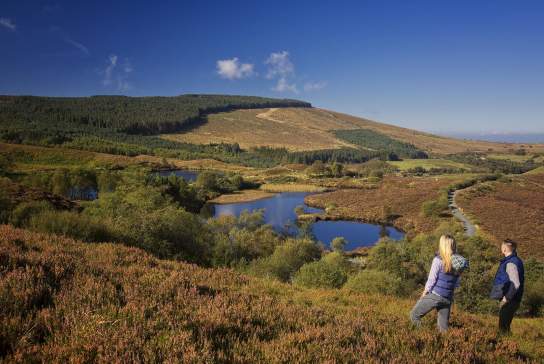 couple enjoying the view of Gortin Lake