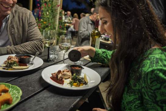 Couple enjoying a meal and a glass of wine at Slemish Supper Club, Ballymena