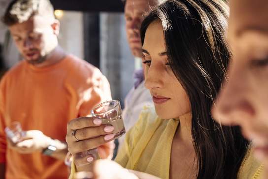 Group taste a cacao shot as part of the Master Craft Chocolate Experience