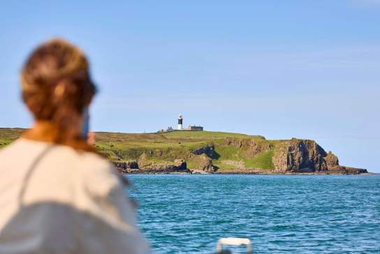 woman looking out over water
