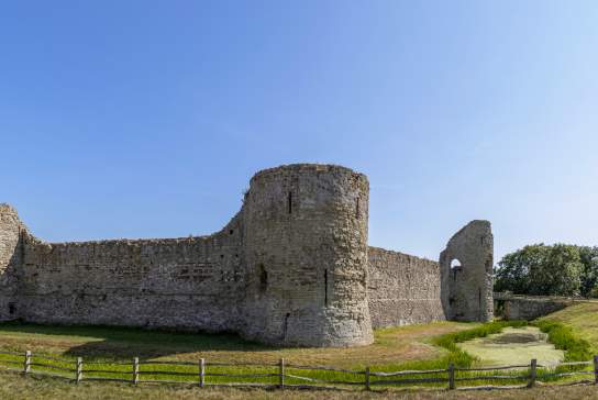 A wide shot of Pevensey castle in the sunshine
