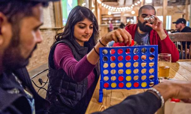 Slow Pour Brewing group playing games
