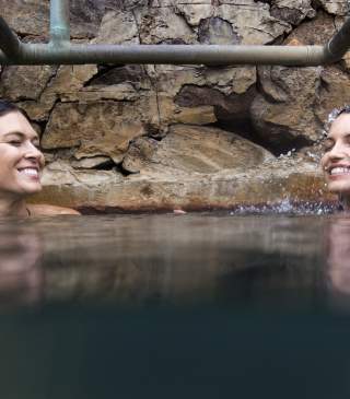 Two women enjoy the features at the Ojo Caliente Mineral Springs Resort and Spa.