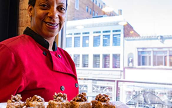 Chef Tootie Morrison of Abby Singer's Bistro in Shreveport with tray of appetizers