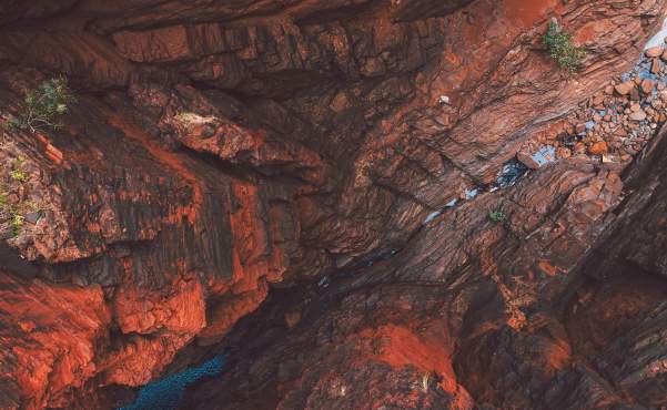 Aerial view of person walking through narrow passageway in Knox Gorge, Karijini National Park